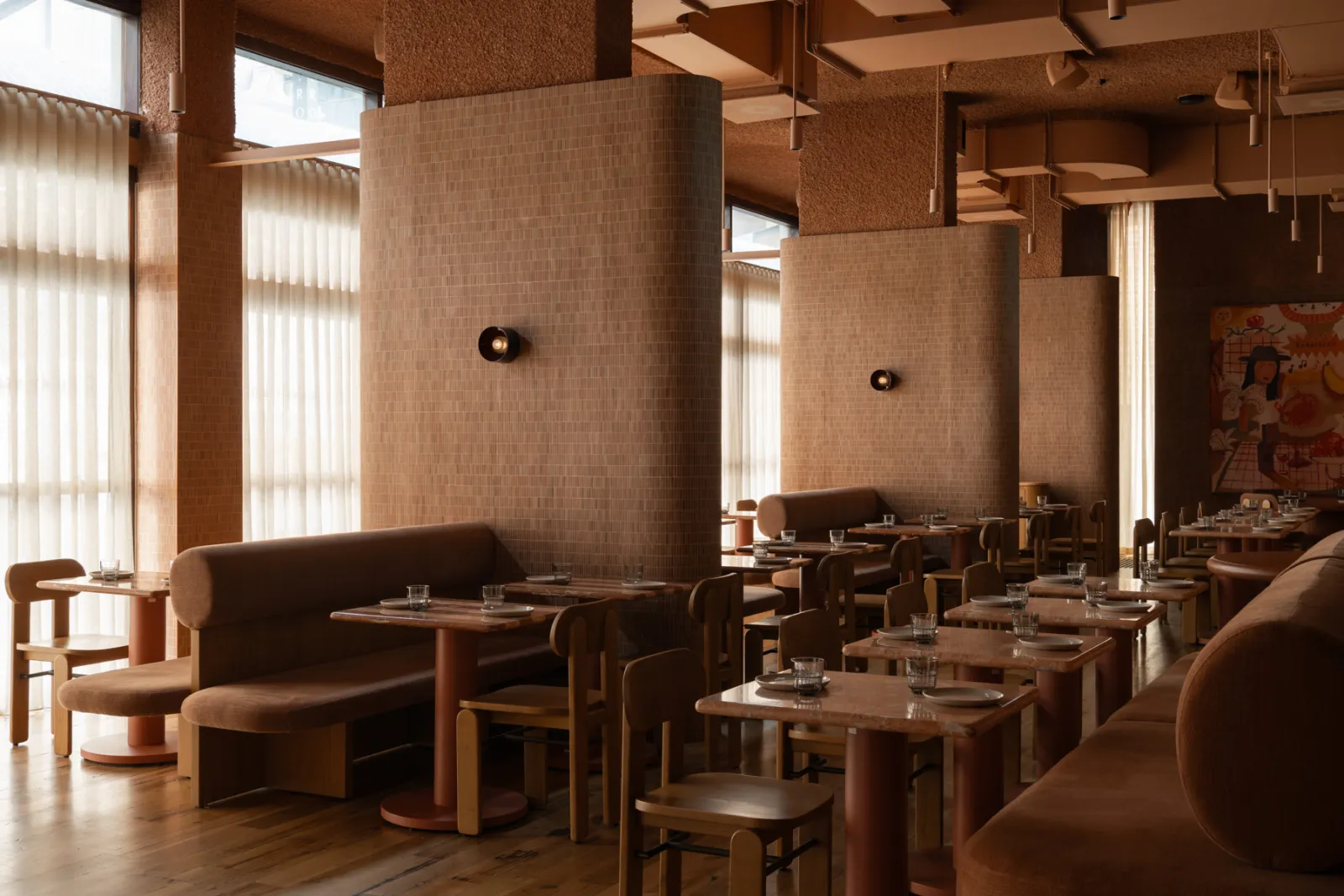 Light Years Asian Diner — terracotta mosaic-tile columns, custom banquettes, and marble café tables